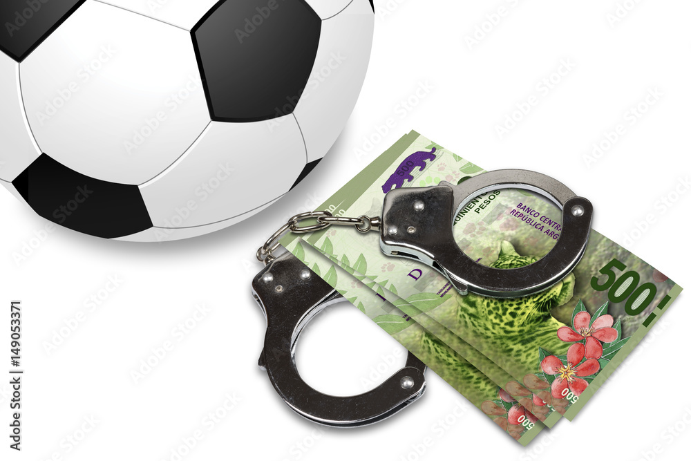 Soccer gambling corruption concept. Soccer ball with money and handcuffs. Soccer gambling corruption concept. Soccer ball with money and handcuffs.