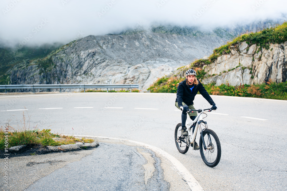 Fototapeta premium Young Man Cycling