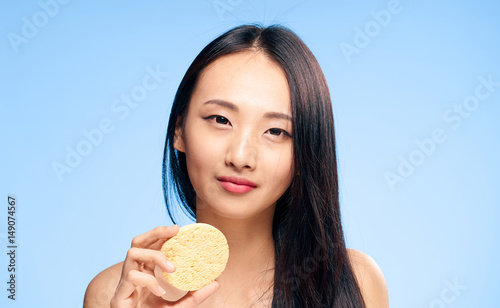 woman with sponge, smile, clean skin