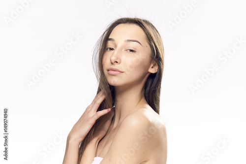 woman with healthy smooth hair on a light background