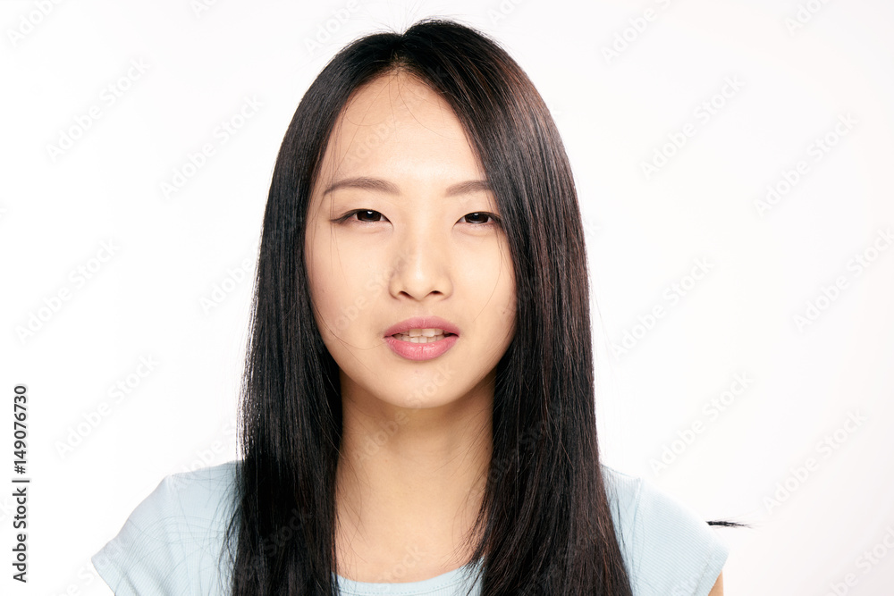 pensive brunette, t-shirt, light background pensive brunette, t-shirt, light background