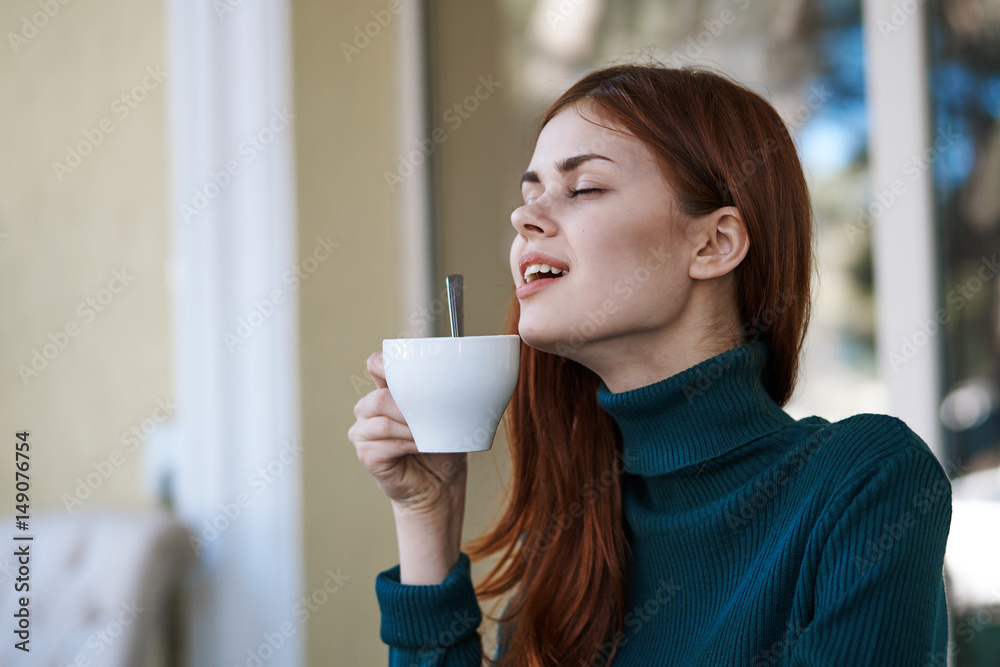 happy woman enjoying breakfast in the morning, mug of tea happy woman enjoying breakfast in the morning, mug of tea