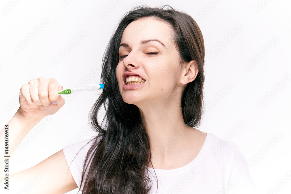 brunette brushes teeth, brush, gum massage brunette brushes teeth, brush, gum massage