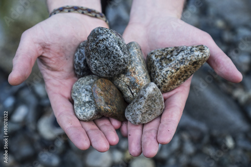 Canvas Print Holding Stones