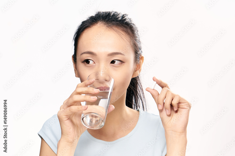 woman with a glass of water, tablet, pills... woman with a glass of water, tablet, pills...