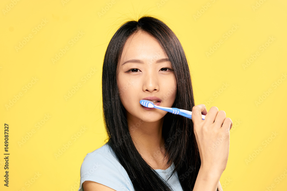 toothbrush, clean teeth, yellow background toothbrush, clean teeth, yellow background