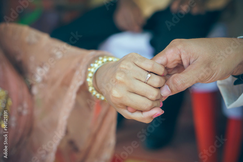 picture of man and woman with wedding ring