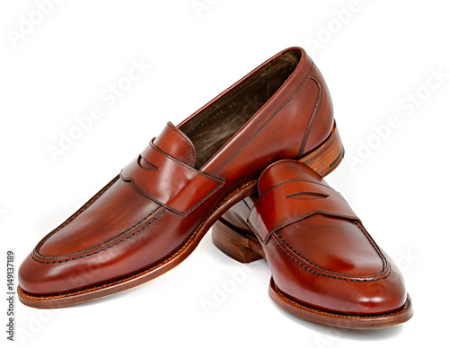 Pair of leather cherry calf penny loafer shoes together photo