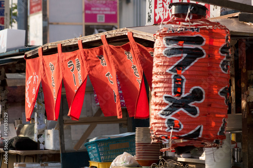 Japanese style food stall and hanging big red lantern
