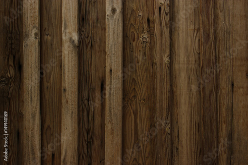 brown wood texture. Background light old wooden panels.Boards are nailed vertically