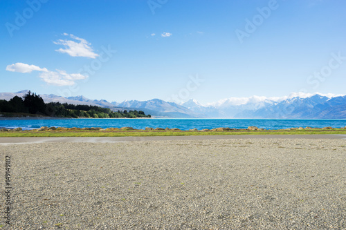empty ground with blue sea in blue sky