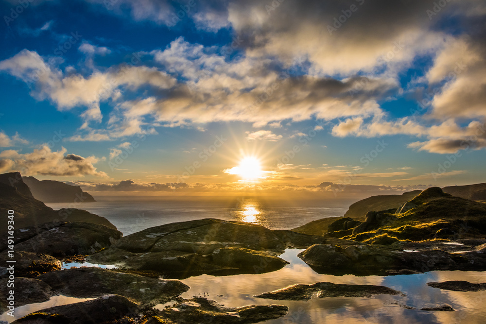 Fototapeta premium A Beautiful landscape with mountains and sunset