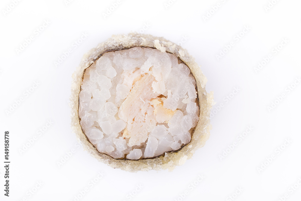 Roasted sushi roll with chicken. Japanese food. Hot roll with a crisp crusty on a white background.