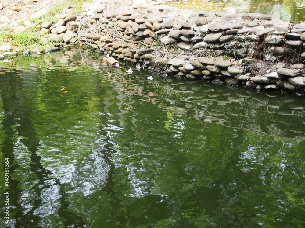 Small stone dam tropical garden Small stone dam tropical garden