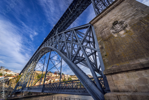 Dom Luis I arch bridge seen from Vila Nova de Gaia city with Porto city on background, Portugal © Fotokon