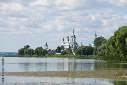 Nero Lake and the Spaso-Yakovlevsky Dmitrovsky monastery on a July cloudy day. Rostov Veliky, Golden Ring of Russia photo
