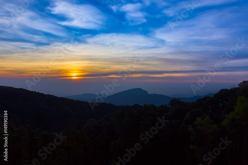 Beautiful Colorful Sunrise and Silhouette Mountain on the top of mountain in Thailand 