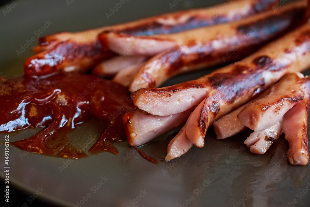 Fried sausages with ketchup Fried sausages with ketchup