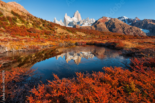 The autumn reflection of the Monte Fitz Roy  Cerro Chalte  - the peak located in Patagonia in the border area between Argentina and Chile  the view from the trail in the National Park of Los Glaciares