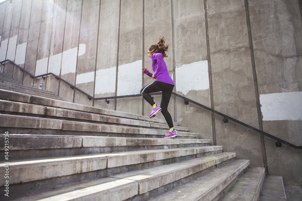 young sporty woman running
