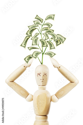 Man with growing from his head money tree. Abstract image with a wooden puppet