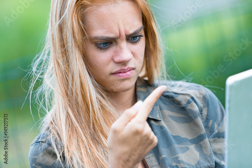 girl disgusted by something on her finger