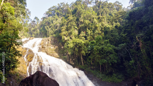 Takah Tinggi water fall in a tropical rain forest in Taman Negara Johor, Malaysia photo