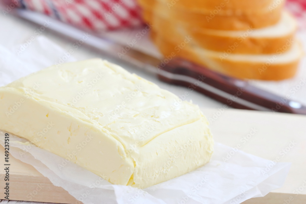 Fresh butter on the wooden table Fresh butter on the wooden table