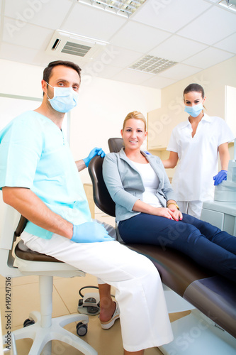 Adult woman getting her checkup at the Dentist