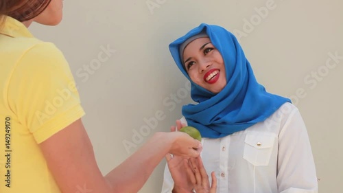 asian muslim woman refraining from food on Ramadan