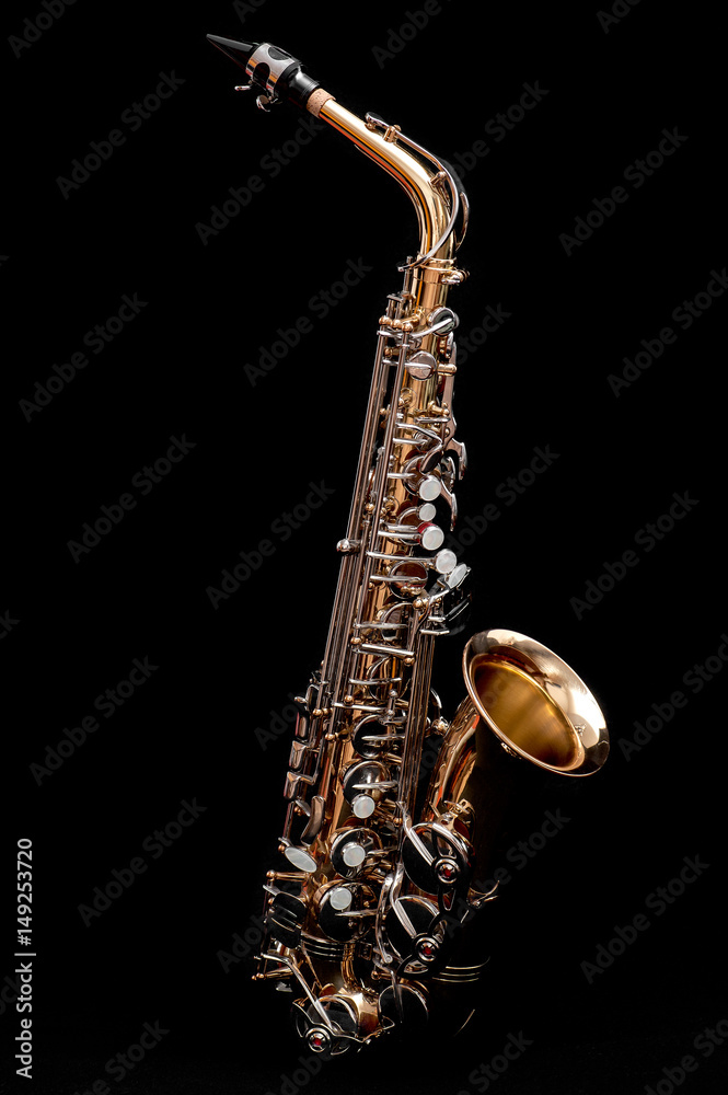 Obraz premium Saxophone isolated on black background