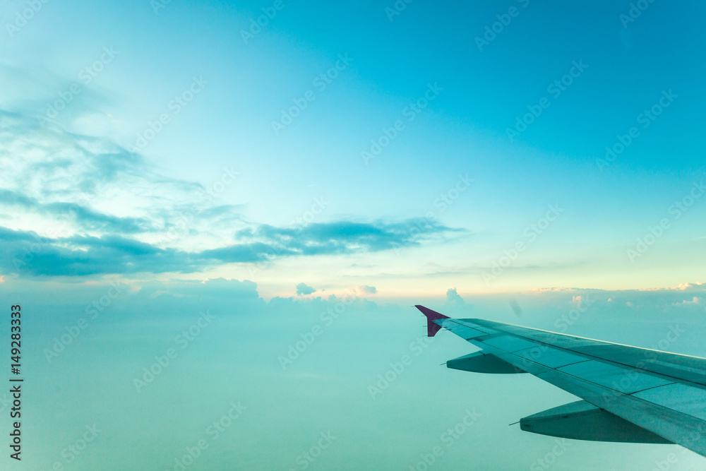 View from plane window, cloud sky View from plane window, cloud sky
