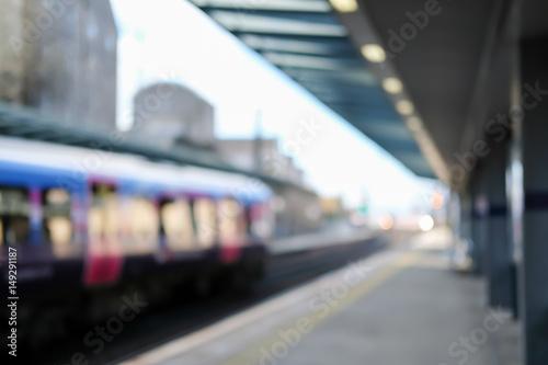 Blurred image bokeh of Train arriving at Heymarket Train Station in Edinburgh, United Kingdom