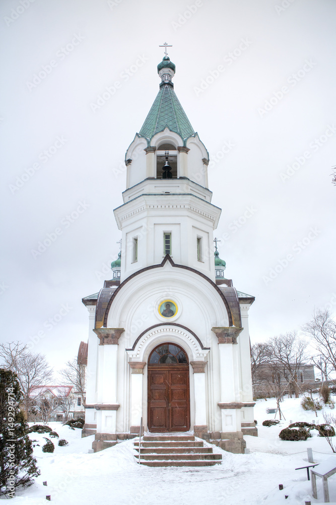 Fototapeta premium HAKODATE, HOKKAIDO - APRIL 22, 2016: St. John's Church and Motomachi district cityscape.