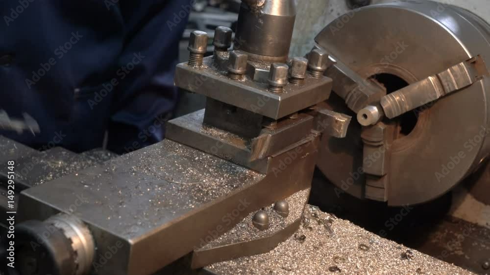 Quality control manufactoring. Profesional mechanic measures the part with a caliper. Steel metal cutting machine process by lathe in the car workshop. Quality control manufactoring. Profesional mechanic measures the part with a caliper. Steel metal cutting machine process by lathe in the car workshop.