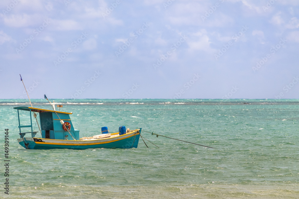 Small Fishing boat in brazilian coast - Pirangi, Rio Grande do Norte, Brazil Small Fishing boat in brazilian coast - Pirangi, Rio Grande do Norte, Brazil