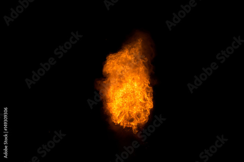 Realistic fiery explosion over a black background