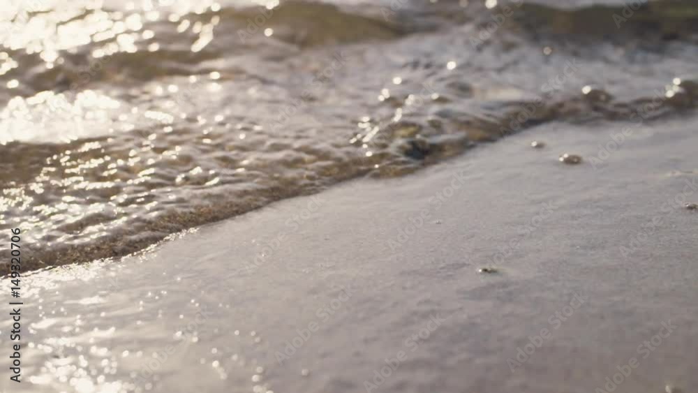 slightly toned waves on lake beach closeup macro, shot in 180fps slightly toned waves on lake beach closeup macro, shot in 180fps