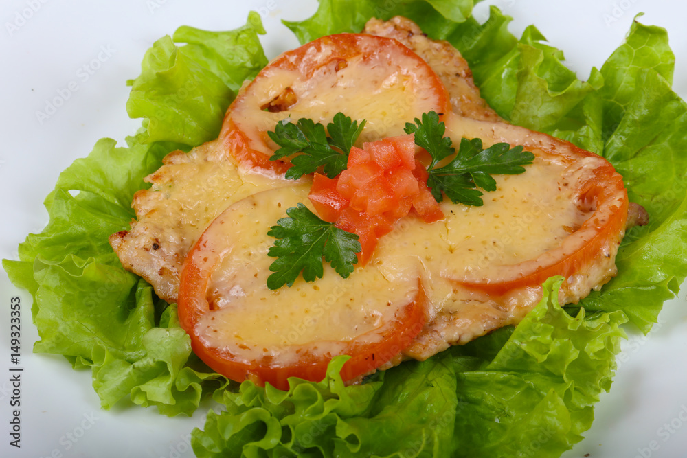 Pork baked with tomato and cheese Pork baked with tomato and cheese