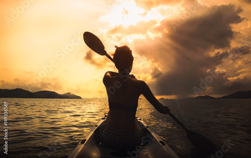 Kayakers enjoying the beautiful sunrise. Picture taken near .Koh Chang Thailand