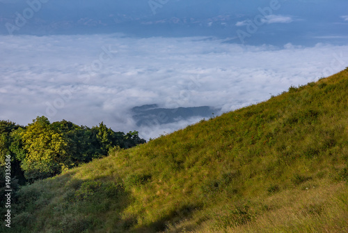 The view point on the top of mountain in Thailand winter and have a soft sea of fog at far away