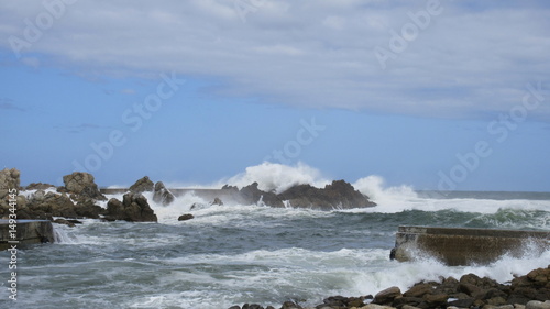 Ocean Wave Crashing on Rocks