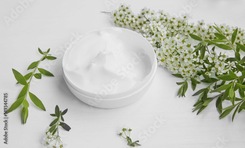Natural herbal skin cream with white flowers, organic cosmetic skincare and spa still life