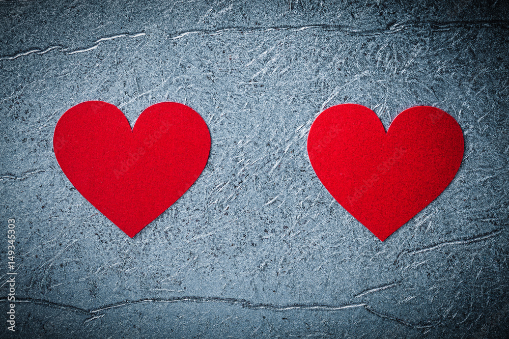 Red paper hearts on metallic background directly above Valentine Red paper hearts on metallic background directly above Valentine