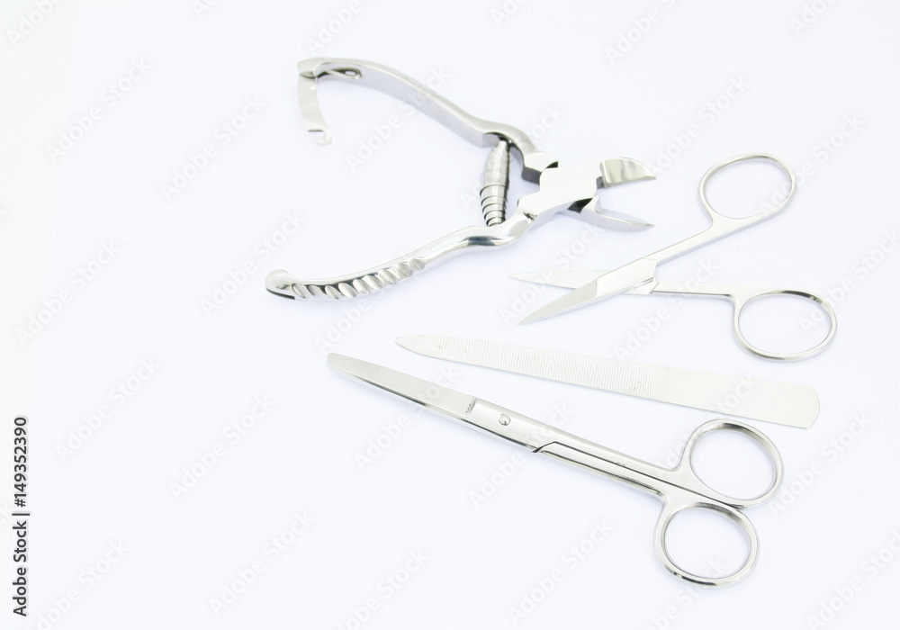 ensemble,de ciseaux,lime et coupe ongle,sur
fond blanc ensemble,de ciseaux,lime et coupe ongle,sur
fond blanc
