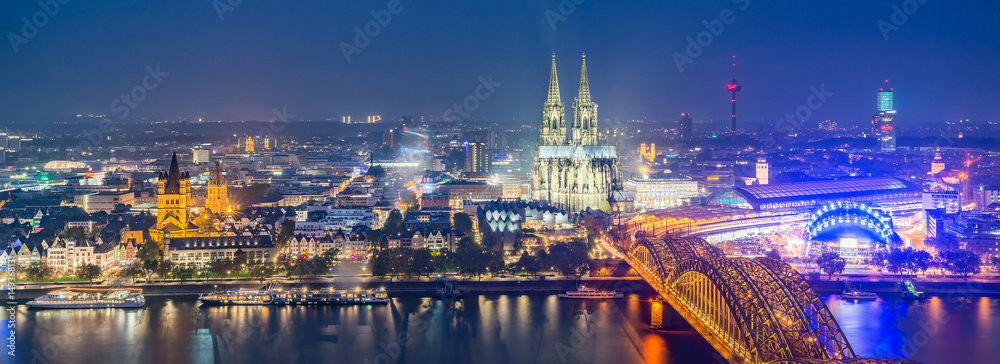Cologne City, Panorama Landmark Beautiful Aerial View of Hohenzollern Bridge over Rhine River, Great St. Martin Church, Colonius TV-tower, Cologne Cathedral, MediaPark skyline in Summer Night, Germany