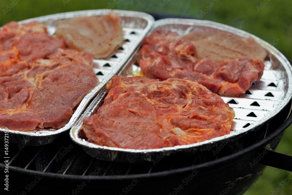 Grilling meats on grill tray Grilling meats on grill tray