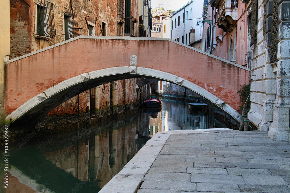 Impression of Venice with its beautiful canals, boats and old houses, Italy