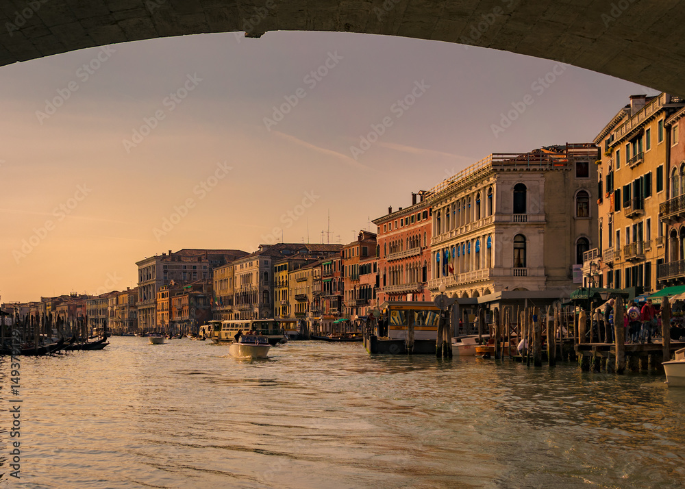 Grand canal at sunset seen from under the Rialto Bridge, Venice.