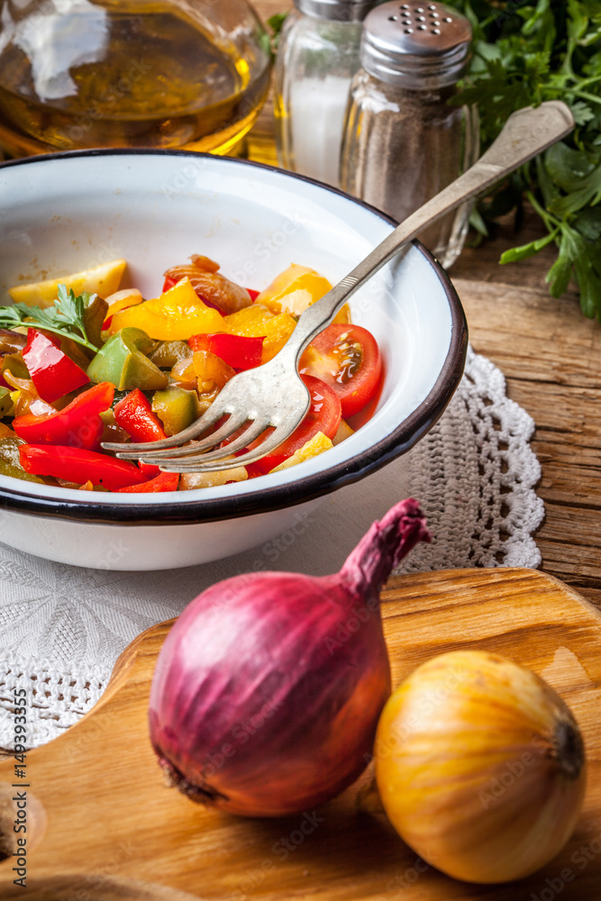 Ratatouille on a rustic table. Ratatouille on a rustic table.